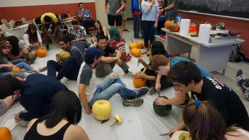 Members carving pumpkins!