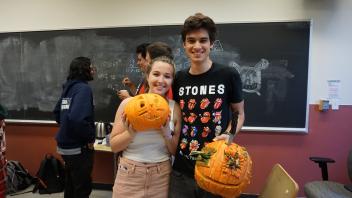 Connor Lyon and Amanda with their carved pumpkins!