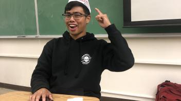Joseph Quesada wearing a Krispy Kreme hat!